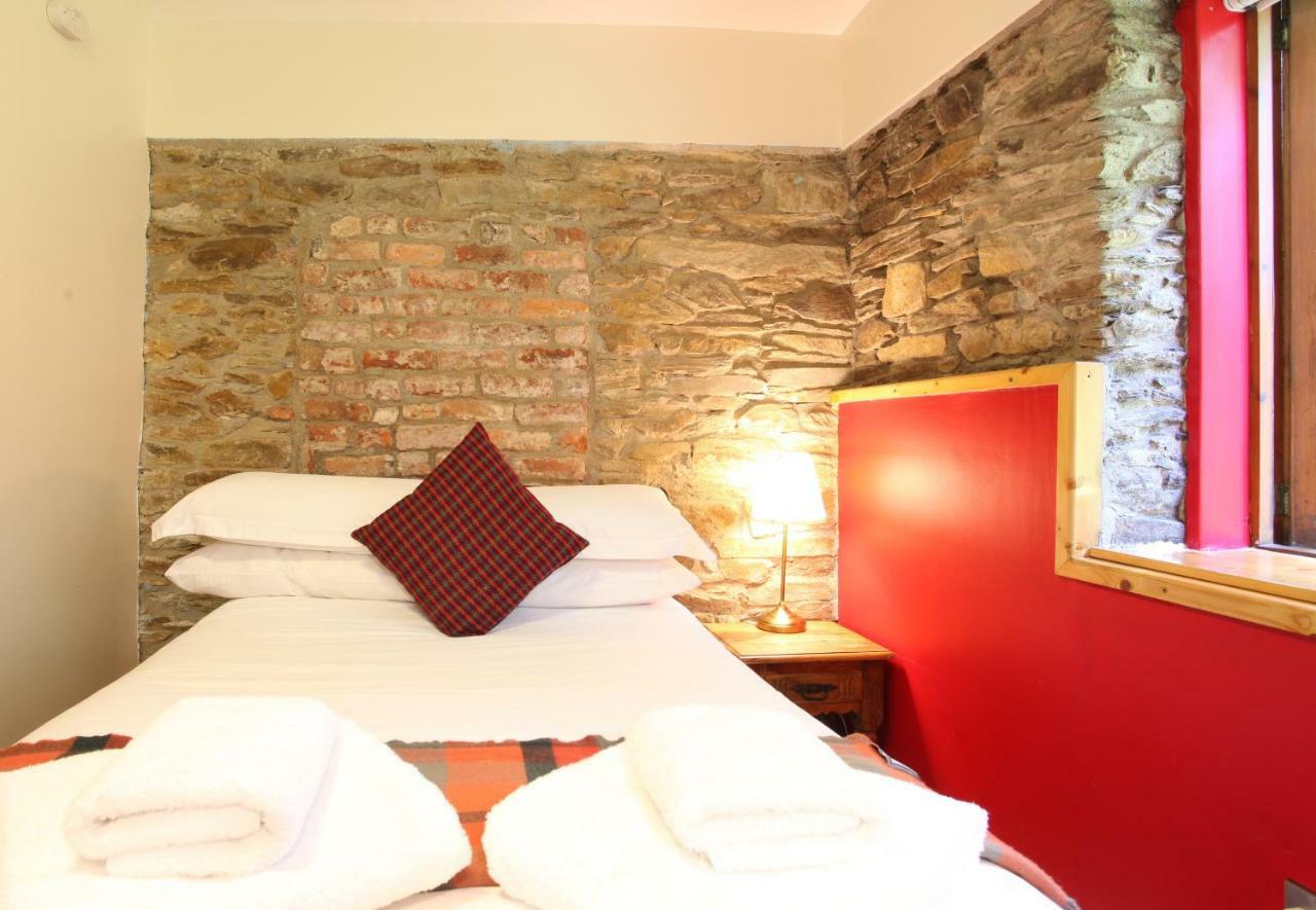 Moville Boutique Hostel & Apartments Rum bild